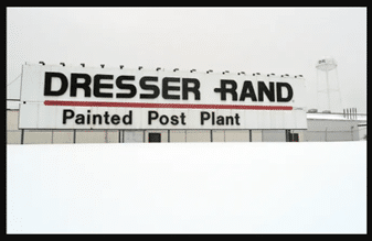 Ingersoll-Rand and the related company, Dresser-Rand, manufacture parts and products for use in various industrial, construction, mining, and commercial settings, including but not limited to drills, jackhammers, compressors, pumps, turbines, engines, pneumatics, machine tools and controls. Prior to the 1980s, asbestos-containing insulation and gasket materials were component parts in compressors and other industrial products being fabricated at that time. Exposure to asbestos can cause mesothelioma, as well as lung cancer and other asbestos-related diseases. Since its first inception as a drill and compressor company in 1858, Ingersoll-Rand has undergone various mergers, acquisitions, and expansions. After the merger of Ingersoll-Sergeant Drill Company with Rand Drill Company in 1905, Ingersoll-Rand grew to become a worldwide manufacturer of industrial products, currently employing approximately 17,000 people at 50 facilities worldwide. Ingersoll-Rand products are sold under more than 40 brand names across all major global markets, such as Milton Roy, Gardner Denver, Nash, Tamrotor, and GHH Rand, just to name a few. During its peak in productivity, Ingersoll-Rand was the biggest employer in the four towns where its original plants were located: Painted Post, NY; Athens, PA; Easton, PA; and Phillipsburg, NJ. The Dresser half of the Dresser-Rand Company began in 1912 as the Clark Brothers Company. In 1938, the Clark Brothers merged with the S.R. Dresser Manufacturing Company, becoming the Dresser-Clark Company. The company adopted the name Dresser Industries in 1956. The company known as the Dresser-Rand Company was formed in 1987 as a joint venture between Dresser Industries and Ingersoll-Rand, where they combined their pump divisions into a new spin-off company. The Dresser-Rand Painted Post plant is located at 100 E. Chemung Street, at the corner of N. Hamilton Street, just off the Southern Tier Expressway in Steuben County, which is very close to Corning, New York. The Rand Drill Company built the first factory in Painted Post in 1899, which eventually expanded to become an Ingersoll-Rand plant when Ingersoll-Rand was established in 1905. Ingersoll-Rand moved out of the Painted Post plant in 1986, and shortly thereafter, the newly-created spin-off company, called Dresser-Rand, moved into the site. The Painted Post plant specialized in manufacturing reciprocating compressors for the oil and gas industry. This involved processes such as metal fabrication, assembly, and field preparation. In 1999, Dresser Industries merged with Halliburton Industries and transferred its controlling interest of the Dresser-Rand Company to Halliburton. In 2004, a private equity firm bought out Ingersoll-Rand’s equity interests in the Dresser-Rand Company. In 2014, Siemens Energy Inc. acquired the entire Dresser-Rand Group, which included the Dresser-Rand Painted Post plant, as well as the plants operated by Dresser-Rand in Olean, New York, and Dresser-Rand in Wellsville, New York. (The Ingersoll-Rand plant located in Athens, PA was not included in the Dresser-Rand Company acquisitions. Ingersoll-Rand closed its Athens plant in 2010.) After acquiring the Dresser-Rand Company in 2014, Siemens Energy closed the Dresser-Rand Wellsville plant in 2020. In 2021, Siemens downsized all of the remaining Dresser-Rand plants and transferred 100 workers from the Olean plant to the Painted Post plant; then Siemens closed the Olean plant in 2022. As of 2023, Siemens has kept the Painted Post plant open to provide technical support and service for the legacy brands of Dresser-Rand steam turbines. Before the United States began phasing out the use of asbestos in industrial components and products in the 1970s and 1980s, some items, such as gaskets and packing, were made with asbestos. The products produced by Ingersoll-Rand and Dresser-Rand were installed on many boats and ships, including U.S. Navy Ships in World War I, World War II, and the Vietnam War. At the same time, many of the plants and facilities being built during this era were constructed using asbestos-containing products, such as fireproofing spray. All of these uses of asbestos put workers and their families at risk. Exposure to asbestos can cause mesothelioma, as well as lung cancer and other asbestos-related diseases. In the process of representing workers and their families, Lipsitz, Ponterio & Comerford has gathered a vast amount of information concerning the type and variety of asbestos-containing products to which our clients were exposed. Our clients understand the importance of securing legal representation as soon as possible after a diagnosis of mesothelioma or lung cancer. If you or a loved one were once employed at the Ingersoll-Rand / Dresser-Rand plant in Painted Post, New York, and have been diagnosed with mesothelioma or lung cancer, please contact us for a free and confidential case evaluation. 